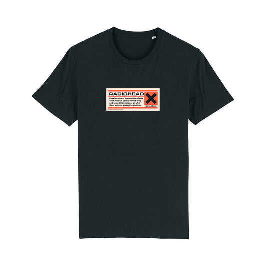 Black t-shirt with a rectangular warning label graphic on the chest.