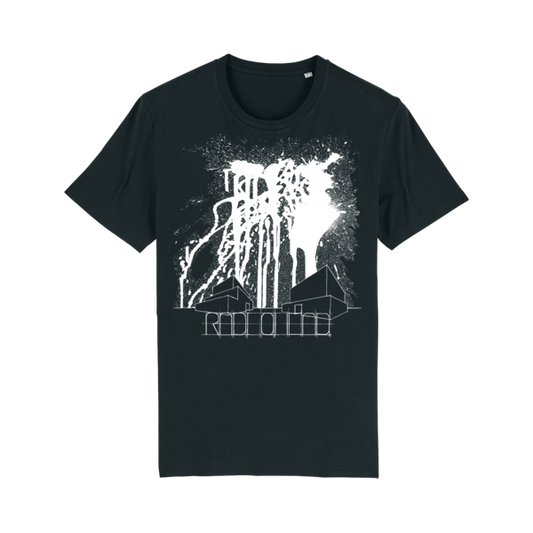 Black t-shirt with a white graphic design featuring a splattered paint effect and cityscape silhouette.